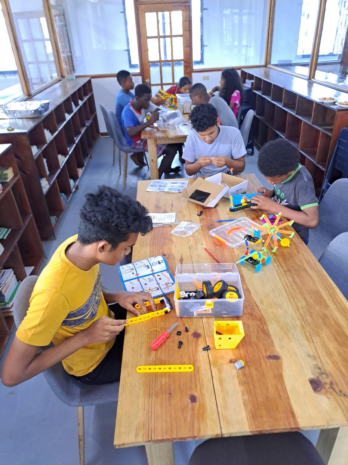 Children building stem kits at ICO’s summer camp