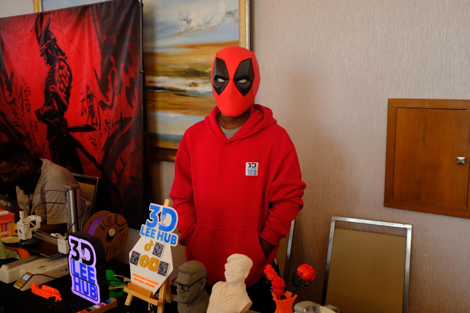 The owner of 3D Hub, wearing one of his own creations