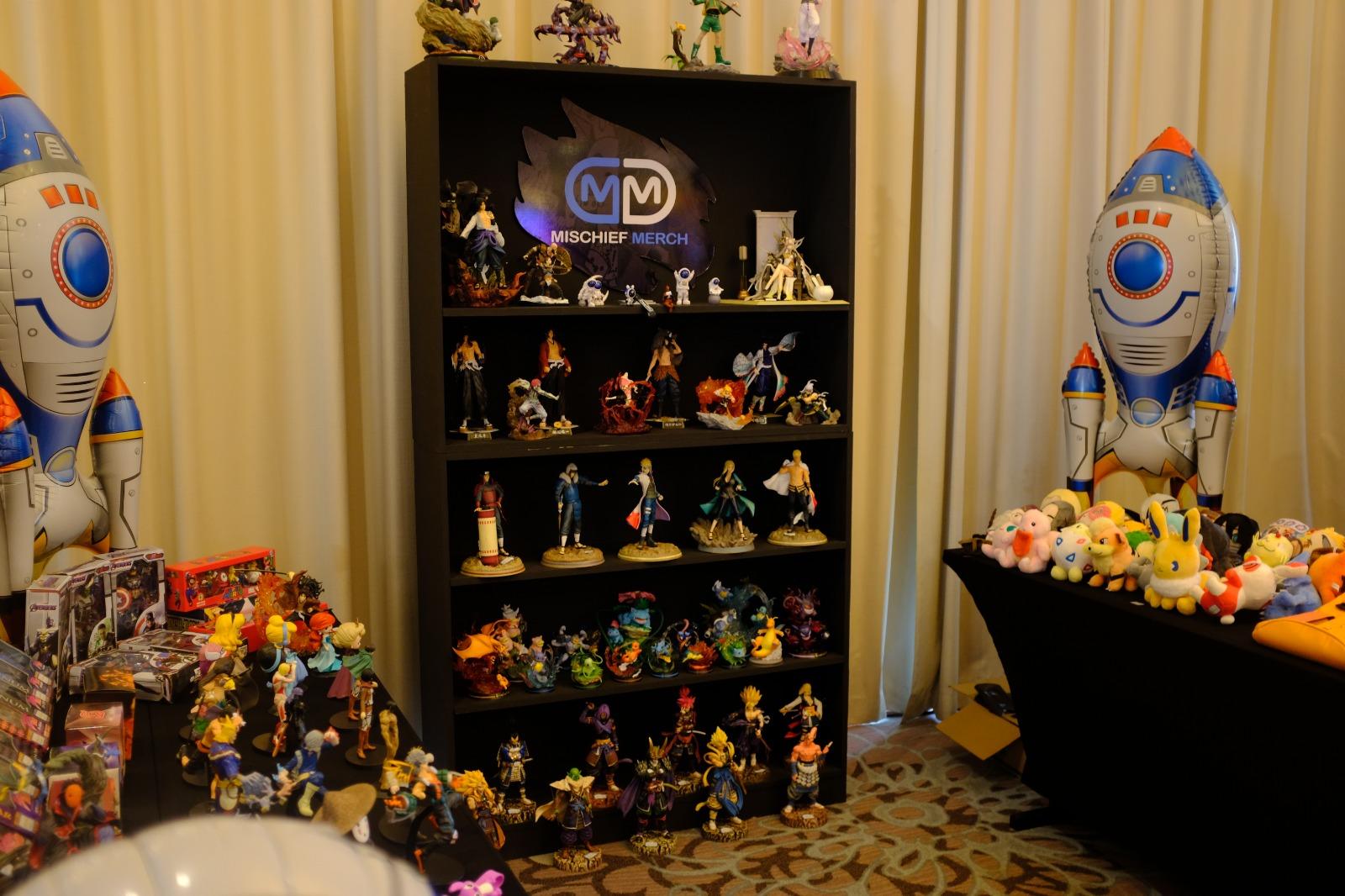 figures and anime merch showcased at the mischief merch booth