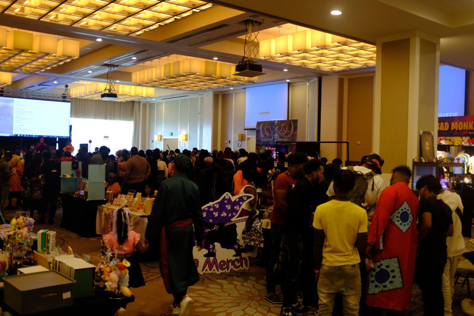 a gathering of people at the event enjoying the band.