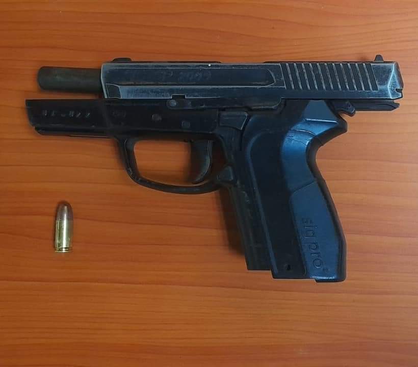 the gun that was taken away from him.