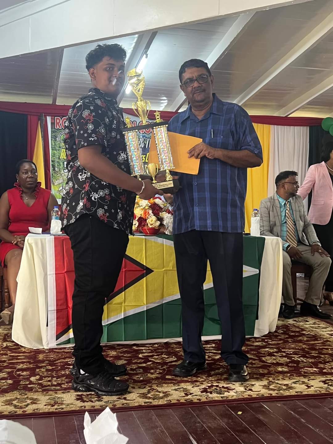 Kevin Singh received his award from Region 6 Regional Chairman David Armogan.