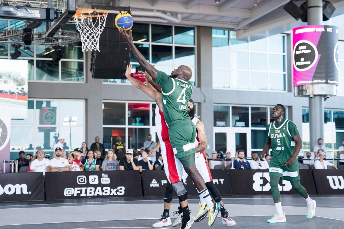 Delroy James scores in Guyana’s clash with Canada at the FIBA 3x3 AmeriCup in Miami.