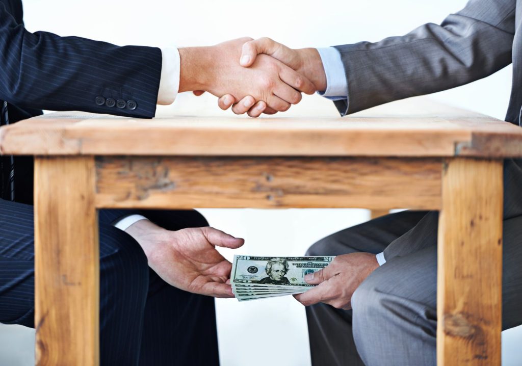 Officials and mining companies using corruption around licenses and contracts to deny citizens a fair share