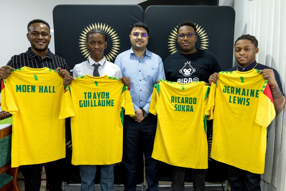 GFF General Secretary, Chattopadhyay (centre), flanked by GFF eSports League (L-R) Moen Hall, Trayon Guillaume, Ricardo Sukra and Jermaine Lewis.