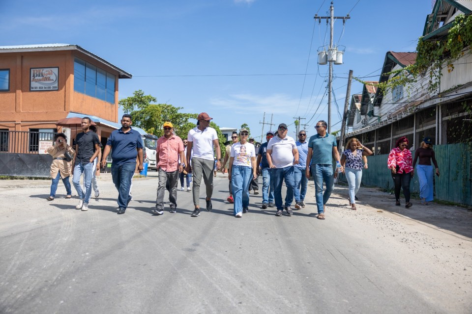  Tiger Bay residents with Minister of Local Government Priya Manickchand during the walk about